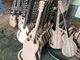 Guitare électrique blanche en forme de V à 6 cordes, de haute qualité, fournissez une sélection personnalisée. fournisseur